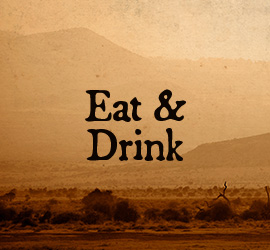 eat and drink button with african wilderness background